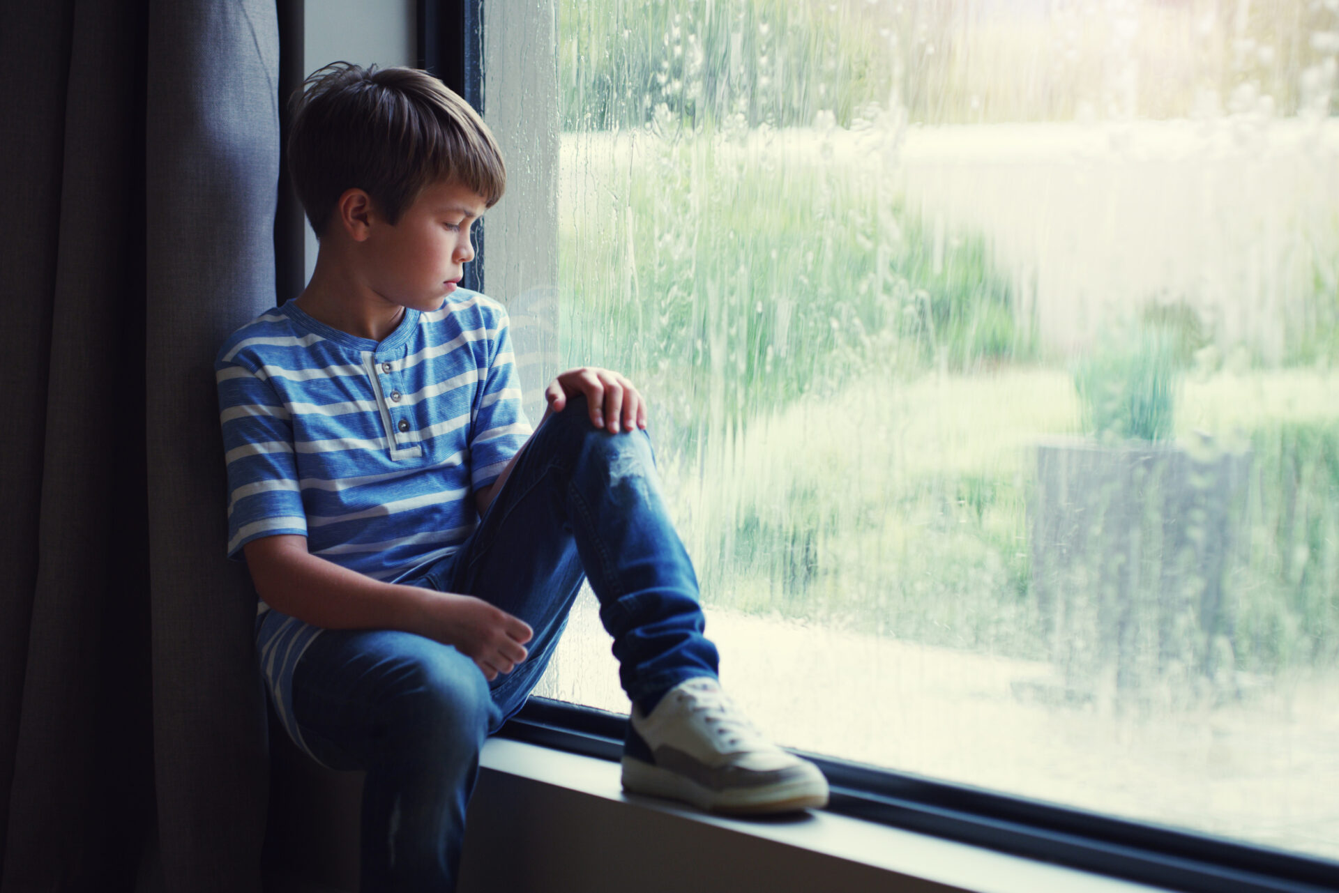 boy-child-rain-sad-by-window-with-thinking-mental-health-space-mockup-home-male-kid-raining-think-by-glass-with-depression-mock-up-bored-with-problem-winter-frustration
