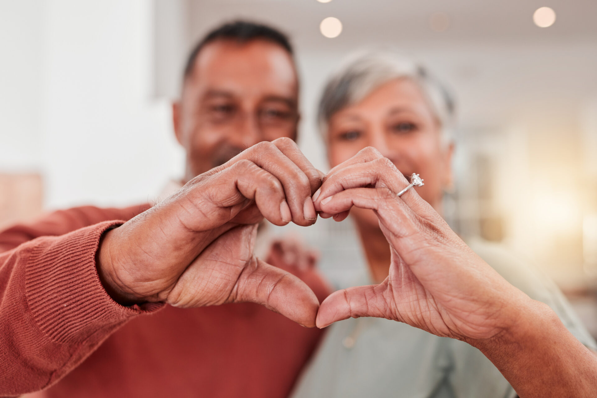 couple-senior-heart-hands-home-love-bonding-retirement-together-romance-hand-gesture-elderly-man-woman-with-emoji-care-affection-empathy-commitment-trust