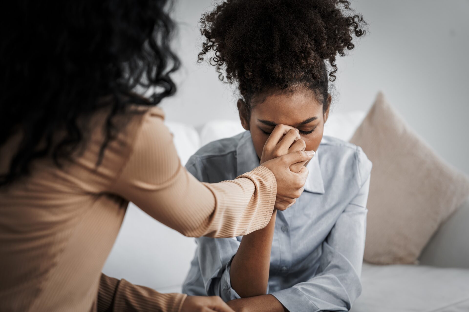 Sad PTSD woman patient in crucial therapy for mental health with psychologist